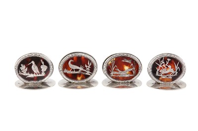 Lot 345 - A cased set of four George V sterling silver and tortoiseshell menu holders, Birmingham 1913 by William Comyns