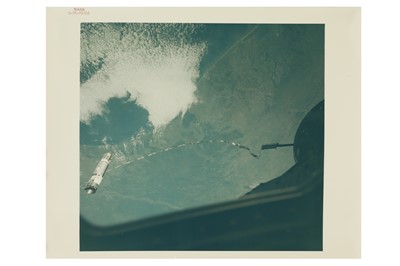 Lot 42 - The Agena tethered to Gemini XII over Houston and the Texas Gulf coast