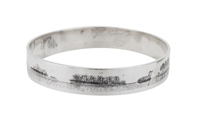 Lot 441 - An early 20th century Iraqi silver and niello bangle, circa 1930 signed Zahroon