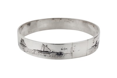 Lot 441 - An early 20th century Iraqi silver and niello bangle, circa 1930 signed Zahroon