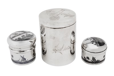 Lot 440 - A mixed group of mid-20th century silver and niello canisters or jars, Omara or Basra circa 1950