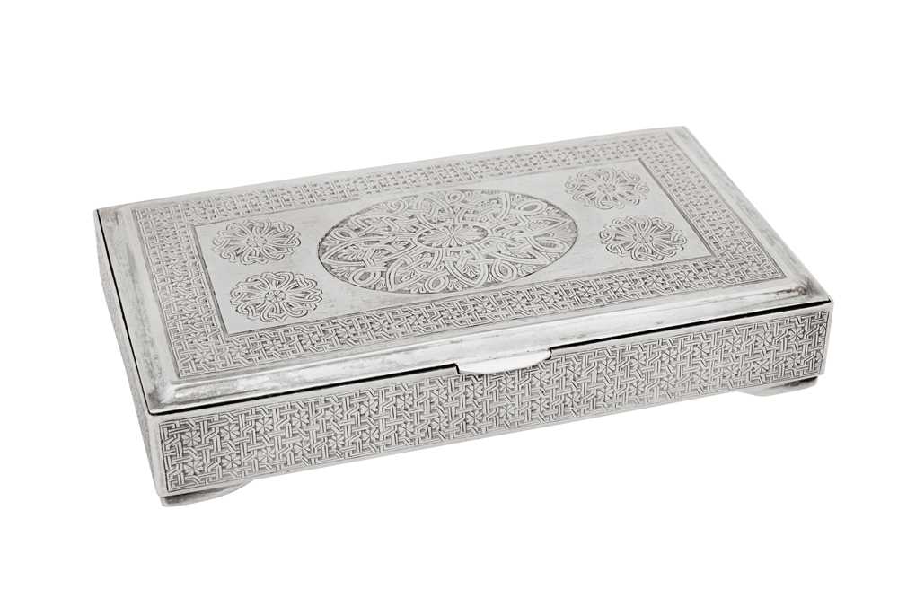 Lot 141 - A late 20th century Persian (Iranian) 840 standard silver cigarette box, Tabriz 1967-79