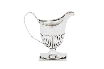 Lot 647 - A George III sterling silver milk jug, London 1794 by John Edwards III