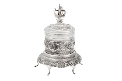 Lot 137 - An early 20th century Burmese silver betel box on stand, Rangoon dated 1928