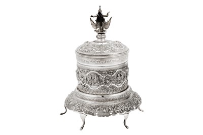 Lot 137 - An early 20th century Burmese silver betel box on stand, Rangoon dated 1928