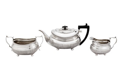 Lot 653 - A George III sterling silver three-piece tea service, London 1814/16 by Solomon Hougham