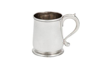 Lot 699 - An early George II sterling silver mug, London 1728 by Robert Lucas (reg. 13th March 1727)