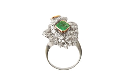 Lot 53 - An emerald and diamond dress ring