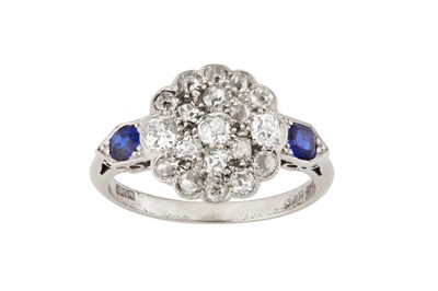 Lot 43 - A sapphire and diamond cluster ring