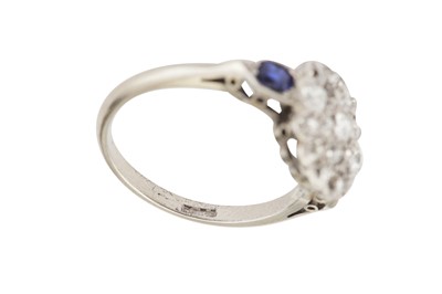Lot 43 - A sapphire and diamond cluster ring