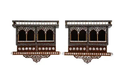 Lot 507 - λ A PAIR OF HARDWOOD EBONY AND MOTHER-OF-PEARL-INLAID DECORATIVE SHELVES