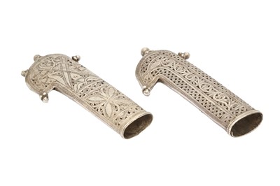 Lot 552 - TWO ENGRAVED AND PIERCED SILVER SCABBARDS OF SHORT JAMBIYA DAGGERS