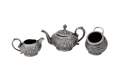 Lot 368 - A heavy late 19th / early 20th century Anglo - Indian unmarked silver three - piece tea service, Kashmir circa 1900
