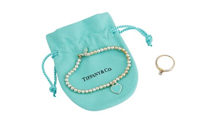 Lot 22 - A DIAMOND SINGLE-STONE RING TOGETHER WITH A BRACELET BY TIFFANY & Co