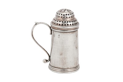 Lot 628 - A George II Irish sterling silver 'kitchen pepper' caster, Dublin circa 1730, possibly by William Sutton