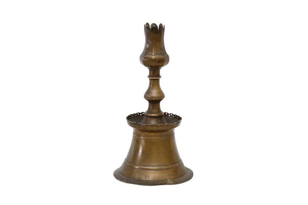 Lot 521 - AN OTTOMAN BRONZE TULIP CANDLESTICK