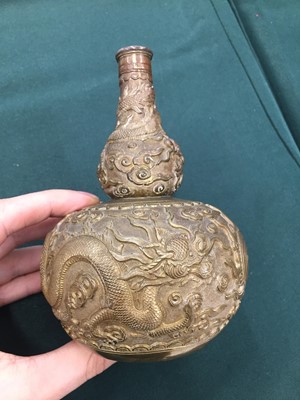 Lot 581 - A CHINESE BRONZE DOUBLE-GOURD 'DRAGON' VASE