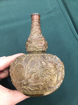 Lot 581 - A CHINESE BRONZE DOUBLE-GOURD 'DRAGON' VASE