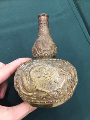 Lot 581 - A CHINESE BRONZE DOUBLE-GOURD 'DRAGON' VASE