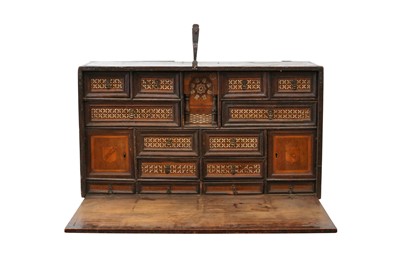 Lot 513 - λ A LARGE HARDWOOD STAINED BONE AND WOOD-INLAID HISPANO-MORESQUE CABINET