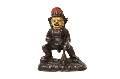 Lot 565 - A WEST-TIBETAN BRONZE FIGURE OF JAMBHALA