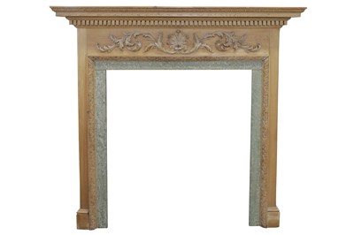 Lot 215 - A CARVED PINE FIRE SURROUND
