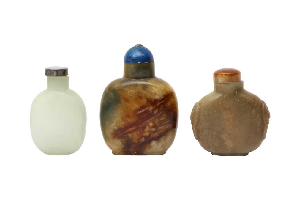 Lot 453 - TWO CHINESE CELADON JADE AND ONE GLASS SNUFF BOTTLE