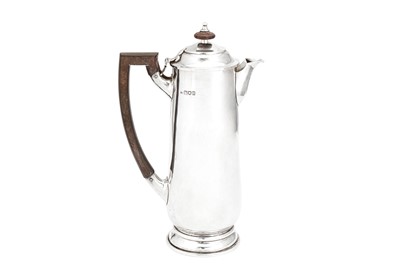 Lot 333 - A George V 'Arts and Crafts' sterling silver hot water or coffee pot, London 1915 by Charles John Plucknett (reg. 15th Dec 1915)