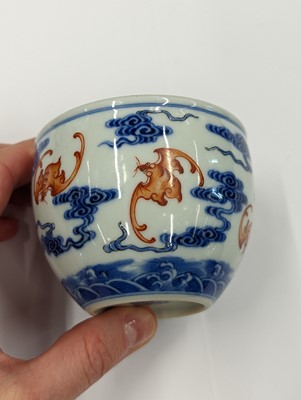 Lot 134 - A CHINESE BLUE AND WHITE AND IRON-RED 'WUFU' CUP