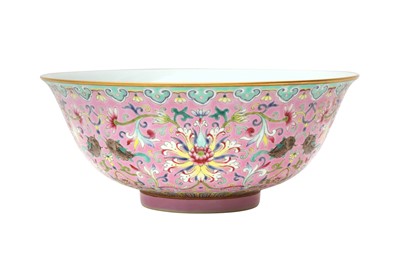 Lot 131 - A CHINESE PINK-GROUND FAMILLE-ROSE 'LOTUS AND FISH' BOWL