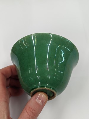 Lot 116 - A CHINESE APPLE GREEN-GLAZED CUP