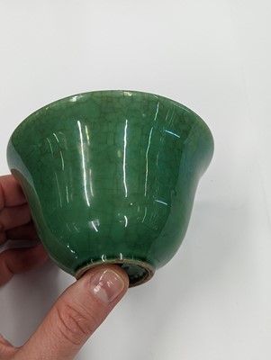 Lot 116 - A CHINESE APPLE GREEN-GLAZED CUP