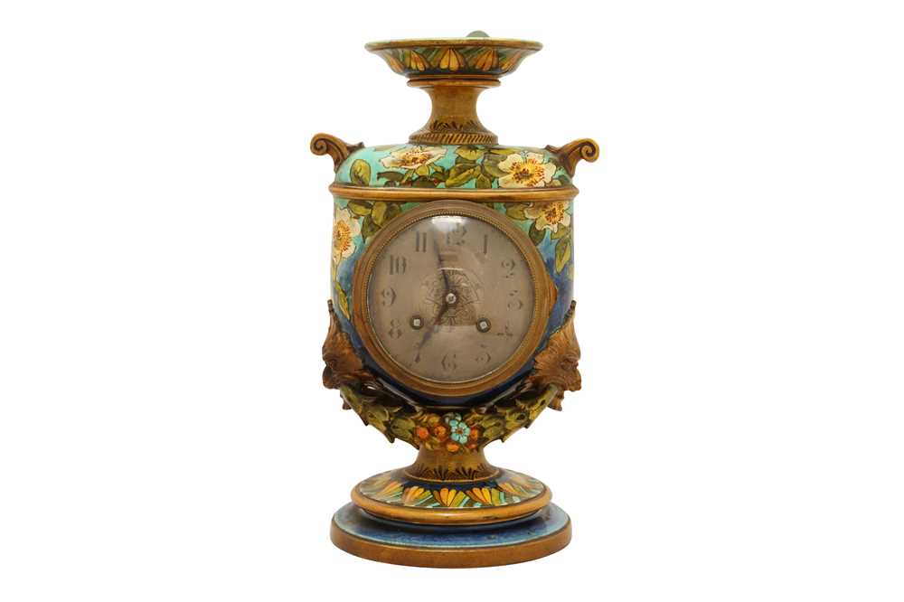 Lot 500 - A DOULTON LAMBETH FAIENCE STONEWARE MANTEL CLOCK