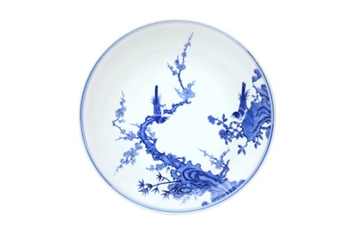 Lot 257 - A CHINESE BLUE AND WHITE 'BIRDS AND BLOSSOMS' DISH