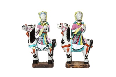 Lot 487 - A MATCHED PAIR OF CHINESE FAMILLE-ROSE 'LADY AND HORSE' FIGURES