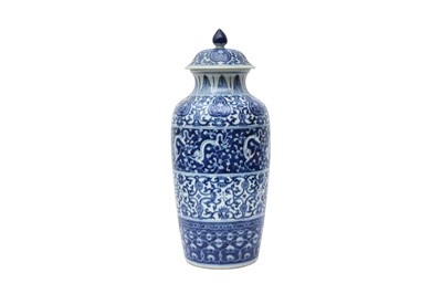 Lot 229 - A CHINESE BLUE AND WHITE 'DRAGON' VASE AND COVER