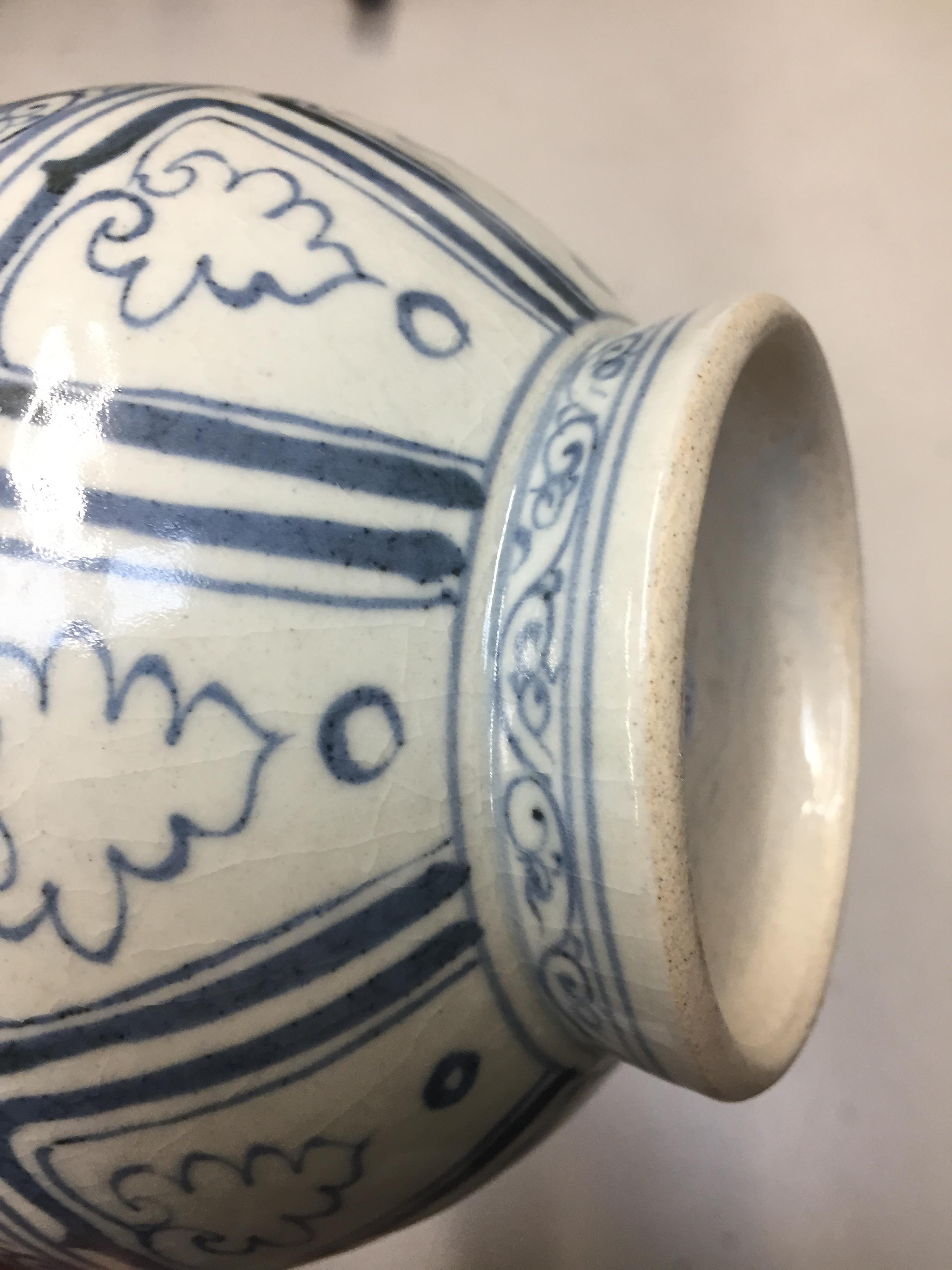 Lot 239 A CHINESE BLUE AND WHITE 'MELONS' VASE,