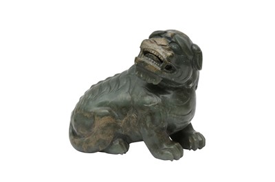 Lot 303 - A CHINESE CELADON JADE MODEL OF A LION DOG