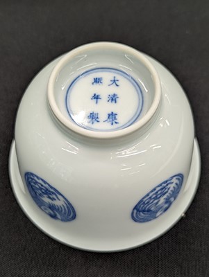 Lot 549 - A CHINESE BLUE AND WHITE 'PHOENIX' CUP
