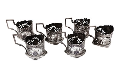 Lot 142 - A set of six Persian (Iranian) niello and silver tea glass holders, Tabriz circa 1940, marked Iran Goldsmith Workshop
