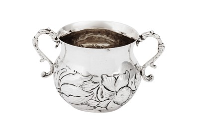 Lot 530 - A Charles II sterling silver porringer or caudle cup, London 1678 by RN crowned, probably for Richard Nightingale (free. 1678, d. after 1701)