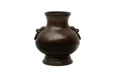 Lot 285 - A CHINESE BRONZE PEAR-SHAPED VASE, HU