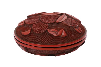 Lot 67 - A CHINESE CINNABAR LACQUER 'LYCHEE' CIRCULAR SEAL PASTE BOX AND COVER