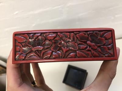 Lot 69 - A CHINESE CINNABAR LACQUER TIERED BOX AND COVER