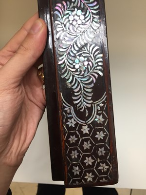 Lot 65 - A CHINESE MOTHER-OF-PEARL-INLAID LACQUER BOX AND COVER