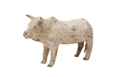 Lot 6 - A CHINESE POTTERY FIGURE OF A BULL