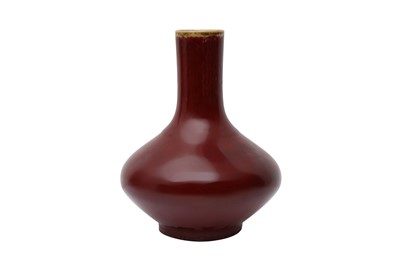 Lot 153 - A CHINESE COPPER-RED VASE
