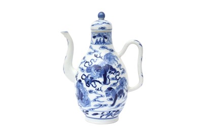 Lot 176 - A CHINESE BLUE AND WHITE 'LION DOG' TEAPOT AND COVER