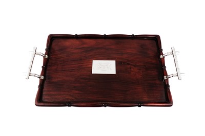 Lot 411 - An early 20th century Chinese Export unmarked silver mounted hardwood twin handled tray, Shanghai circa 1930