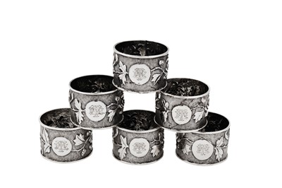 Lot 408 - A set of six early 20th century Chinese Export unmarked silver napkin rings, Shanghai circa 1930